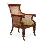 A GEORGE IV MAHOGANY BERGERE LIBRARY ARMCHAIR, CIRCA 1825, ATTRIBUTED TO GILLOWS