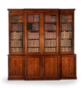 Y A REGENCY ROSEWOOD AND BRASS MOUNTED BREAKFRONT LIBRARY BOOKCASE, CIRCA 1815