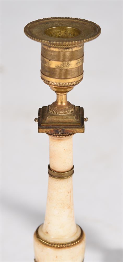 A PAIR OF GEORGE III WHITE MARBLE AND GILT METAL MOUNTED CANDLESTICKS, CIRCA 1810 - Image 2 of 3