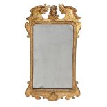 A GEORGE I GILTWOOD WALL MIRROR, CIRCA 1720