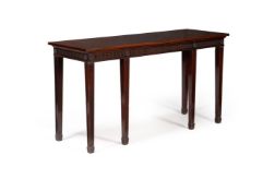 A GEORGE III MAHOGANY SERVING OR HALL TABLE, IN THE MANNER OF INCE AND MAYHEW, CIRCA 1790