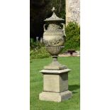 A LARGE AND IMPRESSIVE SWEDISH COMPOSITION STONE GARDEN URN ON PLINTH, 20TH CENTURY