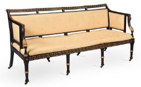 A REGENCY BLACK PAINTED AND PARCEL GILT SOFA, CIRCA 1815, IN THE MANNER OF THOMAS HOPE
