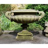 A MONUMENTAL CARVED STONE TWIN HANDLED PEDESTAL VASE, MID-19TH CENTURY