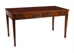 A rectangular mahogany writing/library table