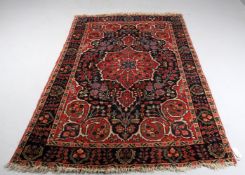 Three rugs including a Tabriz pattern North West Persian rug