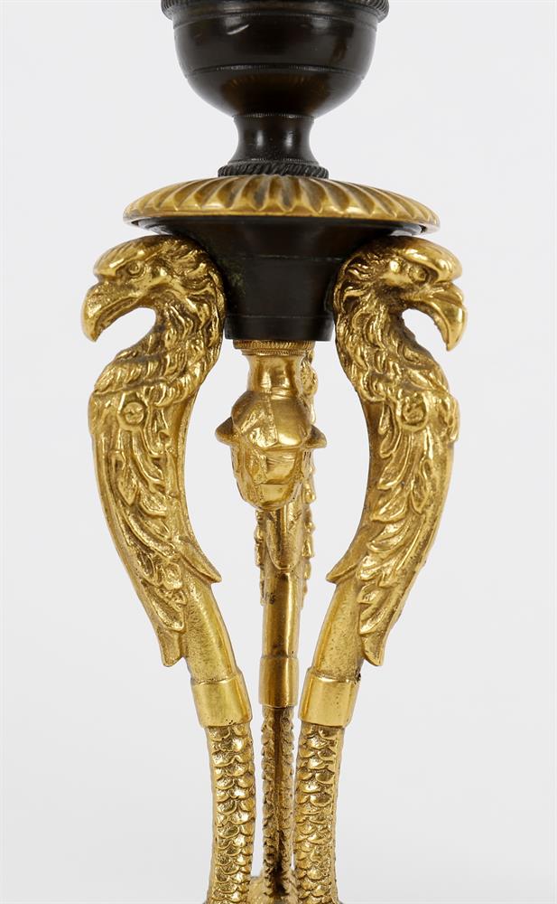 A pair of French Empire parcel gilt and patinated bronze candlesticks - Image 4 of 4