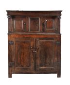 An 18th century oak court cupboard