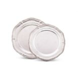 A graduated pair of silver shaped circular serving plates by C. J. Vander Ltd