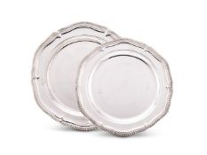 A graduated pair of silver shaped circular serving plates by C. J. Vander Ltd