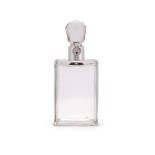 A medium silver mounted lockable glass decanter and stopper by Hukin & Heath Ltd