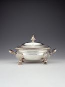 A late George II silver oval soup tureen and cover by Aymé Videau