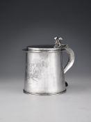 A Commonwealth or Charles II silver straight-tapered tankard by Anthony Ficketts