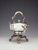 Y An early Victorian silver compressed spherical kettle on stand by Robert Garrard II