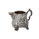 A Victorian silver bombé shaped cream jug by Richard Sibley