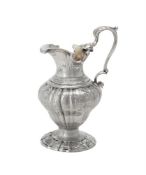 A George II silver lobed ogee baluster cream jug by Francis Crump