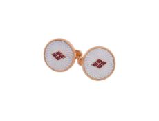 Y A pair of ruby and mother of pearl cufflinks by William & Son