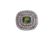 An early 20th century diamond and green tourmaline Austro Hungarian target cluster brooch