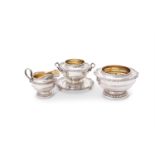 Four pieces from a silver circular pedestal tea service by James Dixon & Sons Ltd