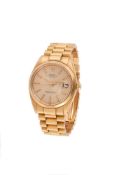 Rolex, Oyster Perpetual Date, Ref. 1500, a gold coloured bracelet watch