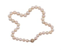 A graduated South Sea cultured pearl necklace by family repute retailed by Graff