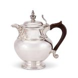 A late Victorian silver covered jug by Charles Stuart Harris