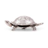 An Edwardian silver mounted novelty tortoise table bell by Grey & Co.