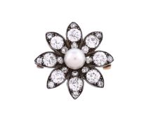 A late Victorian diamond and pearl flower head brooch