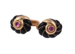 A pair of ruby and onyx cufflinks by William & Son