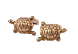 A pair of diamond set tortoise cufflinks by William & Son