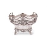 An Edwardian silver mounted cut glass quatrelobed bowl by William Comyns & Sons