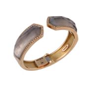 Y An 18 carat gold Crystal Haze hinged bangle by Stephen Webster