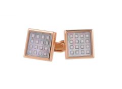 Y A pair of diamond and mother of pearl cufflinks by William & Son
