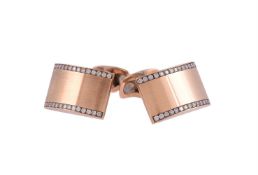 A pair of diamond cufflinks by William & Son