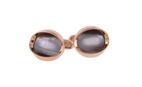 Y A pair of mother of pearl cufflinks by William & Son