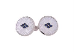 Y A pair of sapphire and mother of pearl cufflinks by William & Son