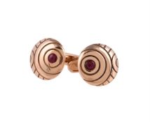 A pair of ruby cufflinks by William & Son