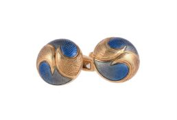 A pair of enamelled cufflinks by William & Son