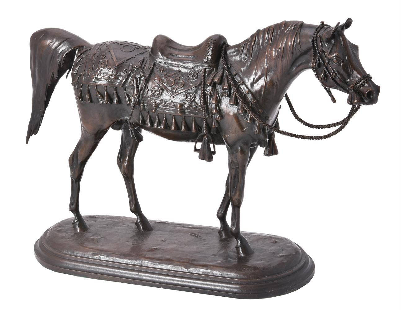 A patinated bronze model of an Arab stallion