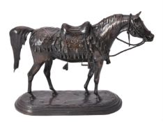 A patinated bronze model of an Arab stallion