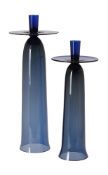 Two graduated glass tall candlesticks by Anna Torfs