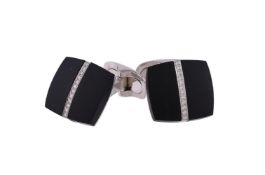 A pair of onyx and diamond cufflinks by William & Son