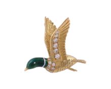A diamond and enamel Flying Mallard duck brooch by William & Son