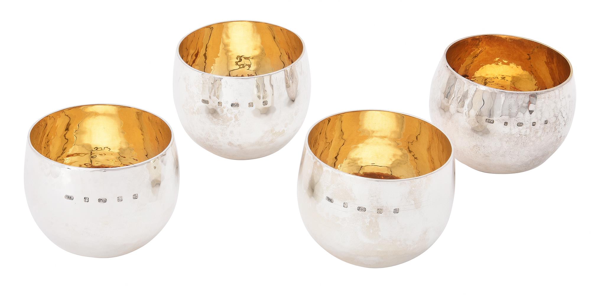 A matched set of four Britannia standard silver tumbler cups by William & Son (William Rolls Asprey)