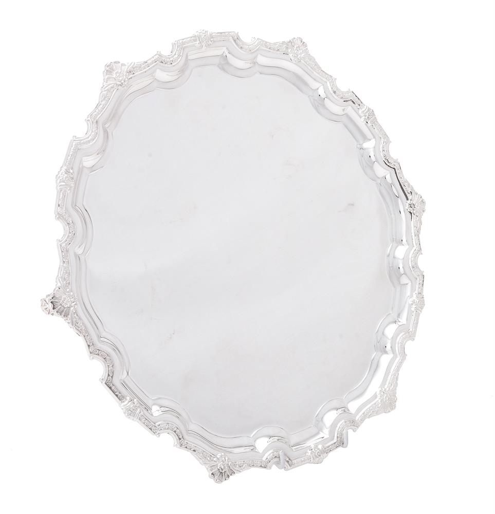 A silver shaped circular Lamerie salver by William & Son (William Rolls Asprey)