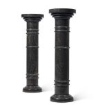 A PAIR OF DARK GREY MARBLE CYLINDRICAL PEDESTALS, LATE 19TH CENTURY