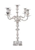 AN EDWARDIAN SILVER SHAPED SQUARE FIVE-LIGHT CANDELABRUM BY MARTIN, HALL & CO.