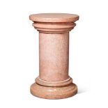 A PINK GRANITE PEDESTAL, LATE 19TH/EARLY 20TH CENTURY