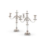 A PAIR OF ELECTRO-PLATED THREE-LIGHT CANDELABRA