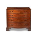 A GEORGE III MAHOGANY SERPENTINE COMMODE, IN THE MANNER OF THOMAS CHIPPENDALE